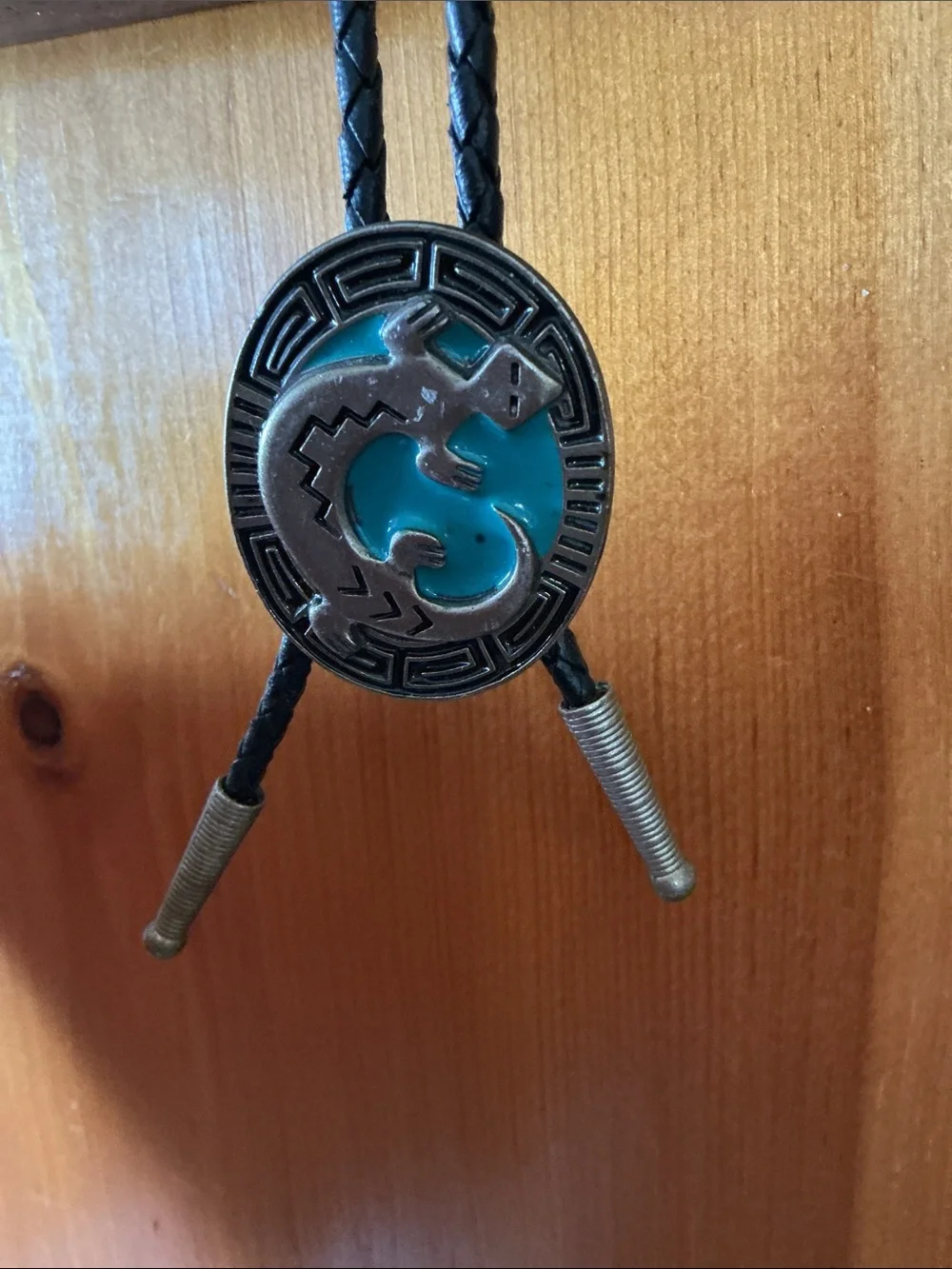 Siskiyou Buckle Co. pewter bolo tie with a braided cord and metal aglets